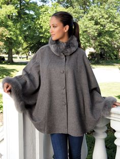 Dress it up or dress it down, you will love the way this enchanting cape complements everything you wear. Discovered during our travels to Peru, it features fluffy soft Alpaca fur around the collar and the hands. It may appear to have sleeves, but instead two hidden snaps inside the cape create a sleeve-like look around your wrists, leaving your arms free to luxuriate in the exquisitely warm and smooth 70% baby Alpaca/30% Merino wool. Available in Gray, Cream or Caramel with button enclosures. M Mickey Mouse Jacket, Patchwork Kimono, Fringe Coats, Faux Fur Cape, Sheer Jacket, Poncho Jacket, Vintage Cape, Boho Layering, Poncho Wrap