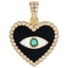 The 14 karat gold enamel pendant is set with .10 carats emerald and .38 carats of shimmering diamonds. Evil Eye symbolizes to ward off negative energy and it promises to keep you safe and sound. See other charm collection. FOLLOW MEGHNA JEWELS storefront to view the latest collection & exclusive pieces. Meghna Jewels is proudly rated as a Top Seller on 1stDibs with 5 star customer reviews. All items manufactured by us are handmade and can be customized or redesigned. Available in black, white, r Elegant Heart Cut Enamel Jewelry, Elegant Enamel Heart Cut Jewelry, Luxury Enamel Jewelry With Diamond Accents, Luxury Heart-shaped Enamel Jewelry, Fine Jewelry Diamond Necklace With Black Enamel, Black Enamel Diamond Jewelry For Anniversary, Enamel Jewelry With Diamond Accents For Anniversary, Diamond Eyes Pendant Jewelry For Anniversary, Anniversary Jewelry With Diamond Accents And Enamel