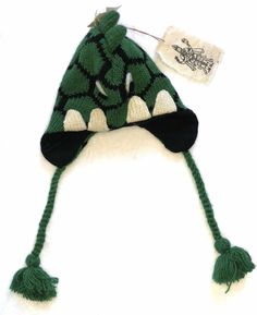 Nirvanna Designs Baby dinosaur handmade winter hat in beautiful bright green One Size    Brand new with tags attached  exterior 100% wool lining 100% polyester (soft like fleece) Adjustable Green Beanie For Cold Weather, Novelty Green Beanie Hat, Adjustable Warm Green Beanie, Adjustable Green Knitted Bonnet, Adjustable Knitted Green Bonnet, Dinosaur Hat, Winter Beanie Hat, Baby Dinosaur, Baby Dinosaurs