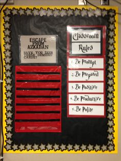 a bulletin board that has some writing on it and is decorated with black, yellow and red