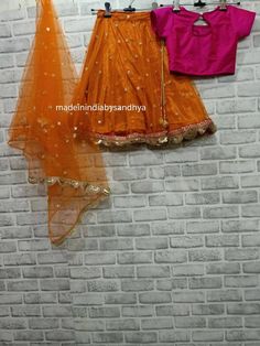 Product: Custom made girl kids dress. Fabric: Lehenga- net and silk with gota work border Top -silk Dupatta - net embroidered Delivery Time : Please keep me informed for any dates or times frame you keeping in mind. Chanderi Sharara For Festivals, Navratri Organza Choli With Gota Work, Fitted Net Sets For Diwali, Organza Sets For Navratri Celebration, Festival Organza Sets With Pallu Detail, Orange Choli With Sheer Dupatta For Navratri, Festive Organza Anarkali Set With Self Design, Organza Choli For Diwali Celebration, Organza Choli With Pallu For Festivals