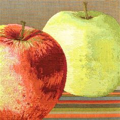 two apples on a striped table cloth with one green apple and the other red apple