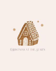 a christmas card with a gingerbread house and snowflakes on the bottom corner