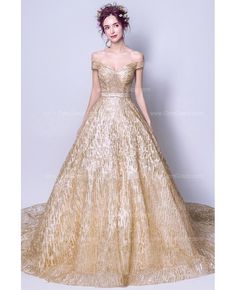 Buy sparkly starry gold sequin prom dress ball gown with off shoulder straps at wholesale price online. Free shipping and pro custom service since 2009. Gold Ball Gown, Debut Gowns, Golden Gown, Ball Gown Prom Dress, Gown Gold, Gold Gown, Golden Dress, Sequin Prom Dress, Sequin Prom Dresses