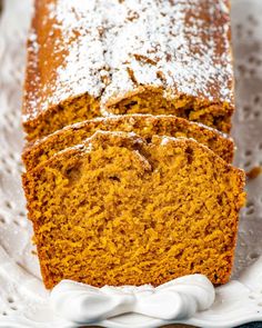 two slices of pumpkin bread on a white plate