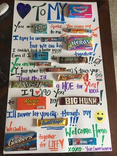 a bulletin board with candy bars and writing on it that says i love my mom