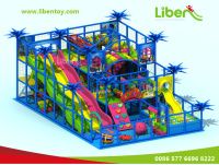 an advertisement for a children's indoor play area with slide and climbing wall in the background