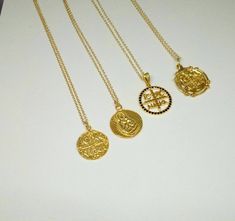 A nice 14k gold filled necklace with an eye catching Christian Pendant. A dainty everyday charm that brings good luck and protects the person that is wearing it. A nice gift for her Length approx. 16 inches / 40.5 ♥ All items will come in a nice gift box ♥ ★ Read our policies before purchase: https://www.etsy.com/shop/Jewellusion/policy/ ★ Convo me for custom orders or any questions you might have ♥ Visit our shop for more fabulous jewels: https://www.etsy.com/shop/Jewellusion/ ♥ Follow me on Pi Plated Medallion Jewelry Gift, Medallion Shaped Plated Jewelry Gift, Byzantine Round Pendant Necklace For Gift, Byzantine Style Round Pendant Necklace For Gift, Byzantine Style Gold-plated Round Jewelry, Byzantine Necklace With Coin Pendant For Gift, Byzantine Necklace With Coin Pendant As Gift, Silver Gold Plated Coin Necklace For Gift, Byzantine Engraved Jewelry For Gifts