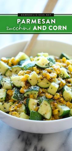 a white bowl filled with zucchini and corn