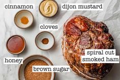 the ingredients to make cinnamon dijond mustard cloves and honey brown sugar