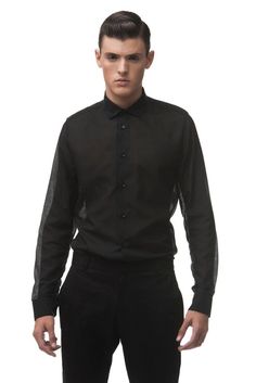 A minimal semi sheer black cotton-silk shirt by ARIEL BASSAN.ARIEL BASSAN is a sophisticated and contemporary menswear brand, that offers a unique and fresh high quality garments with a distinct signature of modern minimalism.This shirt is made out of a 30% Silk and 70% Cotton, Semi Sheer, Soft Woven Fabric.Model's height is 183cm/6'0'' and he wears size M.-----------------------------------------------------••• Have a question about this item? •••••••  Don't hesitate and contact us!  ••••�•----- Overshirt Men, Silk Shirt Men, Mens Dress Shirts, Modern Textiles, Man Clothing, Make Clothes, Sheer Shirt, The Occult, Contrast Collar