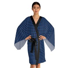 Make a stylish statement with our exquisite Kimono, perfect for lounging at home or turning heads when out and about. These kimono-style robes are as beautiful as they are cozy, designed with a figure-flattering shape that enhances your natural elegance. This chic mid-length robe features flowing bell sleeves and a belt, making it an absolute delight for Japanese style enthusiasts. Crafted from 100% polyester, each kimono offers a smooth and silky feel, providing ultimate comfort and luxury. Elevate your wardrobe with our stunning kimono, ideal for those who appreciate stylish loungewear, elegant robes, and Japanese-inspired fashion. Perfect for relaxing at home, adding a touch of sophistication to your daily routine, or making a fashionable appearance. Embrace the blend of beauty, comfort Black Open Front Robe For Loungewear, Black Open Front Evening Kimono, Black Wrap Kimono For Spring, Black Summer Loungewear Robe, Elegant Wrap Kimono For Home, Elegant Black Summer Robe, Elegant Black Kimono For Loungewear, Elegant Black Loungewear Kimono, Black Open Front Kimono