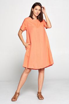 - Short sleeve dress - Side hidden pockets - Chic simple design  - Comfortable breezy - Great for any occasion  - 100% linen - Made in USA Size measurements Style was measured laid flat.   Please multiply by two to get approximate circumference *Small bust : 20" waist : 23" hip : 26" bottom hem : 30" length : 38.5" sleeve : 8.25" *Medium bust : 21" waist : 24" hip : 27" bottom hem : 31" length : 39" sleeve : 8.5" *Large bust : 22" waist : 25" hip : 28" bottom hem : 32" length : 39.5" sleeve : 9" Plain Relaxed Fit Beach Dress, Beach Plain Relaxed Fit Dress, Beach Relaxed Fit Plain Dress, Solid Short Sleeve Linen Beach Dress, Solid Color Short Sleeve Linen Beach Dress, Solid Linen Beach Dress With Short Sleeves, Solid Color Linen Dress For Beach With Short Sleeves, Spring Dress With Rolled Sleeves And Relaxed Fit, Spring Dresses With Rolled Sleeves And Relaxed Fit