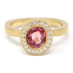 This 18k gold Lux plus ring features an 8x6mm pink sapphire accented with round full cut white diamonds. Our Lux plus rings feature a more substantial band to accommodate deeper full cut gemstones. Stacks perfectly with the Hewn Hammered 2x2 Plain Band. Pictured in:18k yellow gold1.3ct pink sapphire.16ctw white diamonds2mm x 1.5mm wide band Jennifer Dawes Design curates the most beautiful collection of diamond and precious gemstones available for all of our designs. Many of our stones are one of Pink Oval Jewelry With Single Cut Diamonds, Oval Pink Jewelry With Single Cut Diamonds, Oval Pink Sapphire Jewelry With Halo Setting, Oval Pink Sapphire Diamond Ring With Accent Stones, Oval Pink Sapphire Jewelry For Anniversary, Oval Pink Sapphire Ring For Wedding And Anniversary, Pink Sapphire Ring, Plain Bands, Recycled Gold