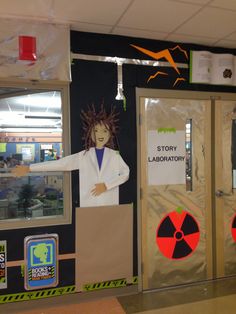 a classroom door decorated with an image of a woman in a lab coat