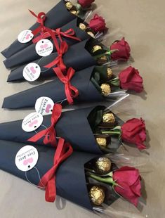 several roses and chocolates wrapped in cellophane