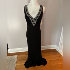 Beautiful Mieka Black Tie Dress With Sliver Beading. Never Worn. Size 8. Formal Beaded V-neck Evening Dress, Beaded Evening Dress For Night Out, Sleeveless Beaded Evening Dress For Formal Events, Sleeveless Beaded Evening Dress For Formal Occasions, Beaded Sleeveless Evening Dress For Formal Occasions, Elegant Beaded Prom Dresses, Glamorous Beaded Formal Dress, Beaded Floor-length Dress For Night Out, Glamorous Formal Beaded Dresses