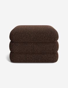 two brown towels stacked on top of each other