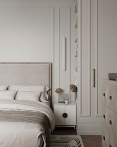 a bedroom with a bed, dresser and mirror in the corner next to a closet