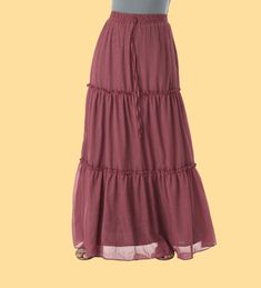 A must have skirt for every boho girl's wardrobe! Our lightweight, shimmer tiered maxi skirt features an elastic waist and tiered hemline. Pair it with sandals and a tee or dress it up with heels for a night out. Runs small- Please go up two size for comfort fitting. 40inch length full lined Hand-wash Tiered Maxi Skirt, Boho Girl, Girls Wardrobe, Elastic Waist, Maxi Skirt, Night Out, Chiffon, Wardrobe