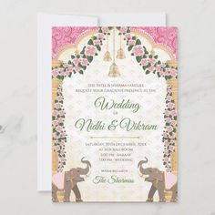 the wedding card features an elephant with flowers on its trunk and bells hanging from it's back