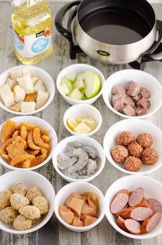 bowls filled with different types of food next to an electric pressure cooker on a table