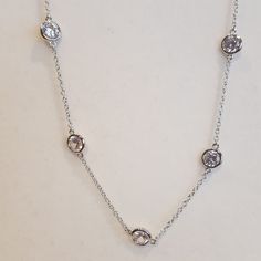 Gorgeous Station Necklace! The Cz's Are So Brilliant, I Can't Capture It Properly On Camera! Rhodium Plating Lobster Clasp Simple And Stunning The Extender Chain Is Removable Adjustable White Gold Necklace With Diamond Accents, Classic Adjustable Cubic Zirconia Necklaces, Classic Adjustable Cubic Zirconia Necklace, Adjustable Classic Cubic Zirconia Necklace, Adjustable Round Necklaces With Sparkling Stones, 16 Inch Silver Necklace For Anniversary, Adjustable Necklaces With Sparkling Stones, 16-inch Silver Necklace For Anniversary, Adjustable Sterling Silver Necklace With Diamond Accents