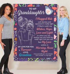 two women standing in front of a sign with the words to my granddaughter on it