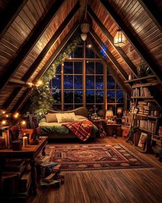 an attic bedroom with a bed, bookshelf and christmas lights