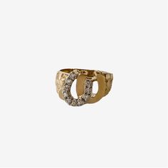 DOUBLE YOUR LUCK WHAT IT IS: 14k double gold horseshoe with diamond detail WHY IT'S SPECIAL: Horseshoes are an iconic addition to your ring stack, especially when they bring old-school vibes Buying vintage is always good for the environment GOOD TO KNOW: 14K Gold Diamonds 6.4 grams ﻿size 7 WHY WE LOVE RECREO: This collection of estate, vintage and antique rings from around the world delivers something unique and distinctive—we love being different. Plus buying vintage is always good for the envi Elegant Gold Horseshoe Rings, Elegant Yellow Gold Horseshoe Rings, Vintage Gold Horseshoe Jewelry, 14k Gold Horseshoe Ring, Diamond Horseshoe Ring For Anniversary, Horseshoe Diamond Ring For Anniversary, Gold Horseshoe Diamond Jewelry, Classic Horseshoe Shaped Anniversary Rings, Gold Diamond Horseshoe Jewelry