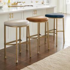 two stools in front of a kitchen counter