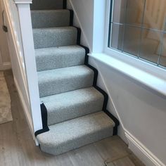 a set of stairs leading up to a window