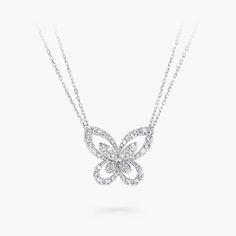 A tender depiction of a butterfly with wings outstretched, outlined in scintillating pavé diamonds, the large Butterfly Silhouette pendant in white gold perfectly captures the delicate beauty of one of nature’s most captivating creatures. Presented on a white gold chain, clusters of pavé stones form a second butterfly silhouette in the centre, bringing a subtle sense of three-dimensionality to the pendant. Butterflies have played a prominent role in the history of the House. An enduring source o Graff Butterfly, Diamond Shaped Engagement Ring, Butterfly Silhouette, Graff Diamonds, Round Diamond Earrings, Triple Hoop Earrings, Diamond Earrings Studs Round, Diamond Butterfly, Pave Diamond Band