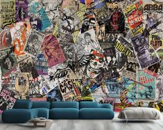 a living room with a couch and wall covered in posters