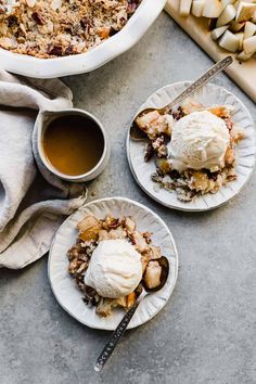 two plates filled with dessert next to a bowl of ice cream