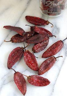 dried goji berries on a marble counter top