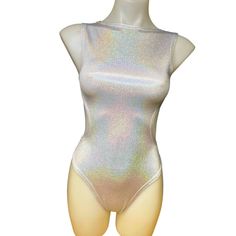 COSMIC Includes a bodysuit with cut-outs on the sides and drop back. The bottoms fit high cut and cheeky. COSMIC is a 4-way stretch polyester spandex blend, which fits tight and stretches to include a variety of body types. Fabric pattern can vary from item to item. Our products are made to order, please review our store policies before purchasing because refunds are not available after purchase. International shipping available. Designer Overalls, Designer Jumpsuits, Festival Accessories, Cutout Bodysuit, South Bend, White Bodysuit, Shades Of White, Fabric Pattern, Womens Bodysuit