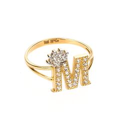 👑 PRODUCT DETAILS Unleash majestic elegance with our exquisite Crown Initial Letter "M" Ring, meticulously crafted from 100% Real Gold 14K and adorned with a sparkling CZ accent. This ring effortlessly marries personalization with regal sophistication. 💍 A Majestic Statement Available in ring sizes from 5 to 9, our Crown Initial Letter "M" Ring makes a statement of both style and significance. With an approximate weight of 2.5 grams, it offers a substantial yet graceful piece to grace your fin M Letter Ring For Women, Luxury Hallmarked Cubic Zirconia Diamond Ring, Classic Initial Ring With Diamond Accents And Cubic Zirconia, Luxury White Gold Initial Ring With Diamond Accents, Elegant White Gold Initial Ring With Cubic Zirconia, Diamond Initial Ring With Brilliant Cut For Anniversary, Gold Initial Ring With Brilliant Cut For Wedding, Elegant Initial Ring With Prong Setting For Anniversary, Elegant Initial Ring With Prong Setting For Gift