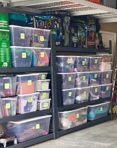 the shelves are filled with plastic bins and other storage containers for various types of items