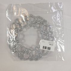 a package of cookie cutters in the shape of hearts