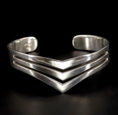 "Mexican 950 Vintage Sterling Silver Modernist Cut out Cuff Markings : \" STERLING\"                 \".950\" Circa 1970s Total weight ~ 34.2 grams  Cuff Width ~ 25mm  Cuff Length ~ 5 3/4\" Cuff Gap ~ 1 1/4\" Cuff has some flex Handmade Made in Mexico Collectible  Investment  Legacy Jewelry  Wearable Art" Silver Modernist Cuff Bracelet For Formal Occasions, Silver Metal Modernist Cuff Bracelet, Luxury Silver Modernist Cuff Bracelet, Adjustable Modernist Sterling Silver Cuff Bracelet, 1970s Jewelry, Eclectic Aesthetic, Adjustable Sterling Silver Cuff Bracelet, Modernist Style, Vintage Jacket, Vintage Sterling Silver