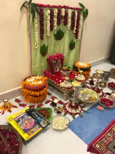 an assortment of food and decorations on the floor