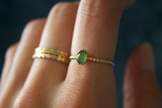 "STUNNING 14k gold filled handmade green serpentine ring✨ * Listing covers just the single green serpentine ring, other rings are sold separately. Beautiful 6x4mm green serpentine gemstone ✨ Green serpentine is associated with the heart chakra. The spiritual meaning of Serpentine is connected to the Kundalini energy. This is the life force energy that runs through our bodies and is often represented as a snake. The word Serpentine comes from the Latin word Serpentinus, which means \"of or belong Dainty Green 14k Gold Stackable Rings, Everyday Green 14k Gold Stackable Rings, Minimalist Green Stackable Rings For Everyday, Minimalist Everyday Green Stackable Rings, Dainty Green Ring For Everyday, Minimalist Green Oval Stackable Rings, Minimalist Handmade Green Ring, Green Minimalist Stackable Rings, Minimalist Green Stackable Rings