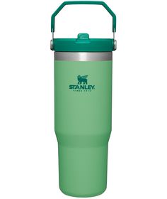 the stanley stainless steel insulated tumbler is shown in green and has a handle