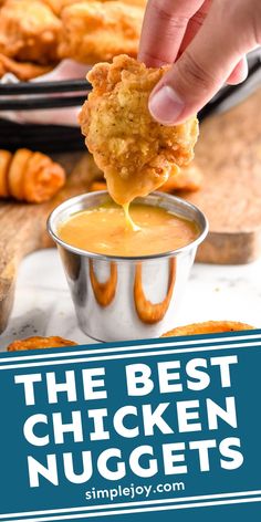 the best chicken nuggets recipe is in a small silver cup with dipping sauce