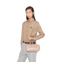 Light padding Leather handles Detachable, adjustable 105 cm leather shoulder strap Gold-tone hardware Varnished metal lettering logo on the front Zipper closure Cotton satin lining with zipper pocket With purse feet Business Beige Shoulder Bag With Branded Hardware, Beige Shoulder Bag With Branded Hardware For Business, Elegant Miu Miu Formal Bags, Formal Miu Miu Shoulder Bag, Luxury Calf Leather Satchel For Work, Elegant Miu Miu Shoulder Bag For Travel, Elegant Miu Miu Leather Shoulder Bag, Formal Miu Miu Bag With Detachable Handle, Miu Miu Formal Bag With Detachable Handle