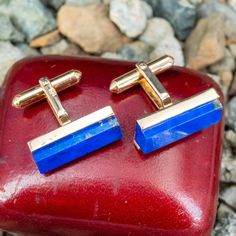 These striking men's cufflinks feature two rectangular lapis pieces and are crafted of 18k yellow gold. Formal Lapis Lazuli Jewelry, Luxury Rectangular Cufflinks With Polished Finish, Brand Presentation, Old Boxes, Cufflinks Men, October Birth Stone, High Quality Jewelry, Estate Jewelry, Cufflinks