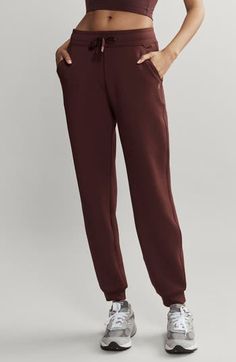 Reward yourself for all those tough workouts in these joggers made from supersoft HeavenliKnit in a relaxed fit so you'll never want to take them off. 29 1/2" inseam; 10" leg opening; 11 1/2" front rise; 13 1/2" back rise (size Medium) Elastic/drawstring waist Front slant pockets; invisible security zip pocket GoldFusion™ antimicrobial technology with gold nanoparticles is engineered to inhibit the growth of odor-causing germs and remains 99.9% effective for the lifetime of the garment 87% polye Sporty Joggers With Ribbed Waistband For Loungewear, Go-dry Athleisure Sweatpants For Loungewear, Sporty Relaxed Fit Joggers For Loungewear, Sporty Joggers For Loungewear With Relaxed Fit, Sporty Joggers With Relaxed Fit For Loungewear, Solid Color Sporty Joggers For Loungewear, Fall Athleisure Sweatpants With Comfort Waistband, Athleisure Sweatpants With Comfort Waistband For Fall, Sporty Solid Color Joggers For Loungewear