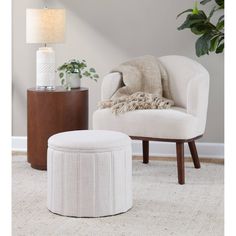 a chair and ottoman in a living room