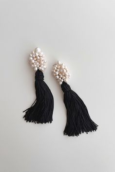 A major statement, veering on the line of old glamour and modern bohemia. The Grande Tassel Earrings, shown in noir, feature a medley of genuine freshwater pearls and black tassels set onto baroque pearl studs. Material: 14k gold filled or sterling silver Measures: 5 1/2" in length Heavier than a standard statement earring Closure: post earring Sold in Pairs Handmade in New York Arrives perfectly packaged, ready for gift-giving! Old Glamour, Affordable Fine Jewelry, Tassel Drop Earrings, Statement Earring, Neutral Fashion, Bridal Necklace, Pearl Studs, Baroque Pearls, Tassel Earrings